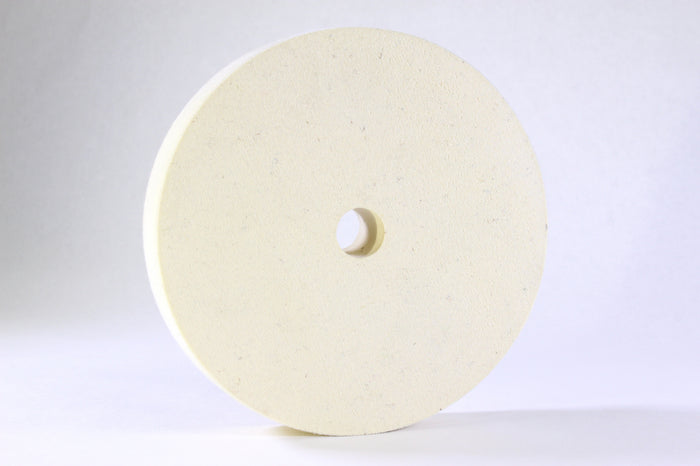 White felt polishing wheel with a centre arbor hole, for lapidary cabbing machines