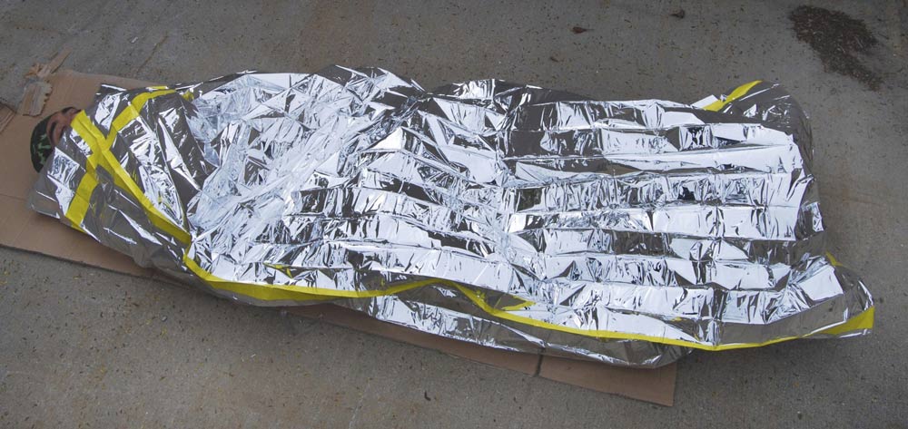 Emergency Sleeping Bag measuring 84" x 36", constructed from 24um thick Aluminized OPP Film.