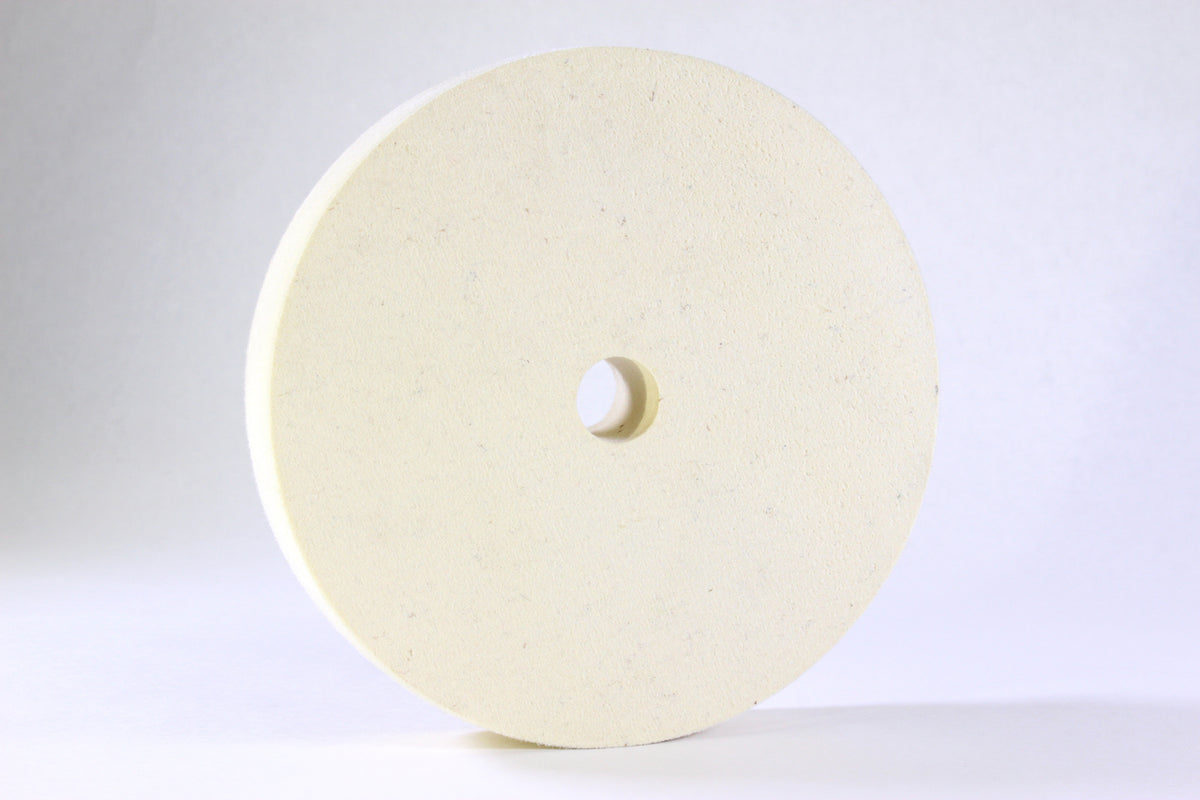 White felt polishing wheel with a centre arbor hole, for lapidary cabbing machines